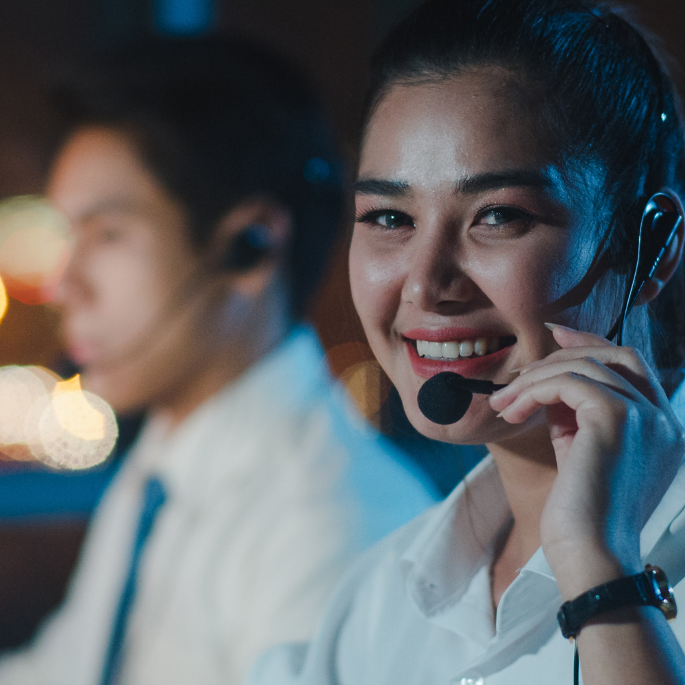 eleVAte Solutions call center agent providing 24/7 customer support with a friendly and professional smile,