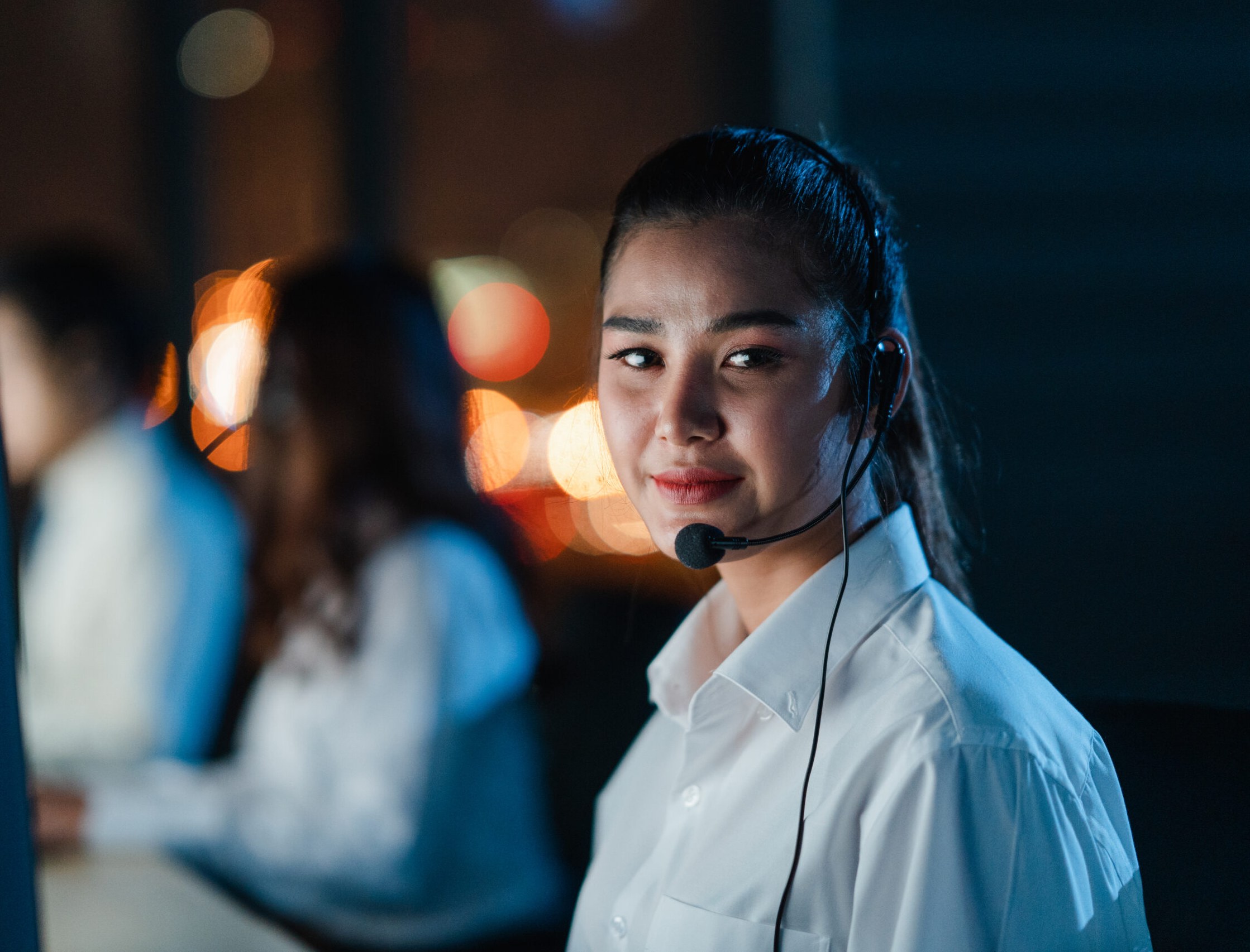 Support specialist on a call during a night shift