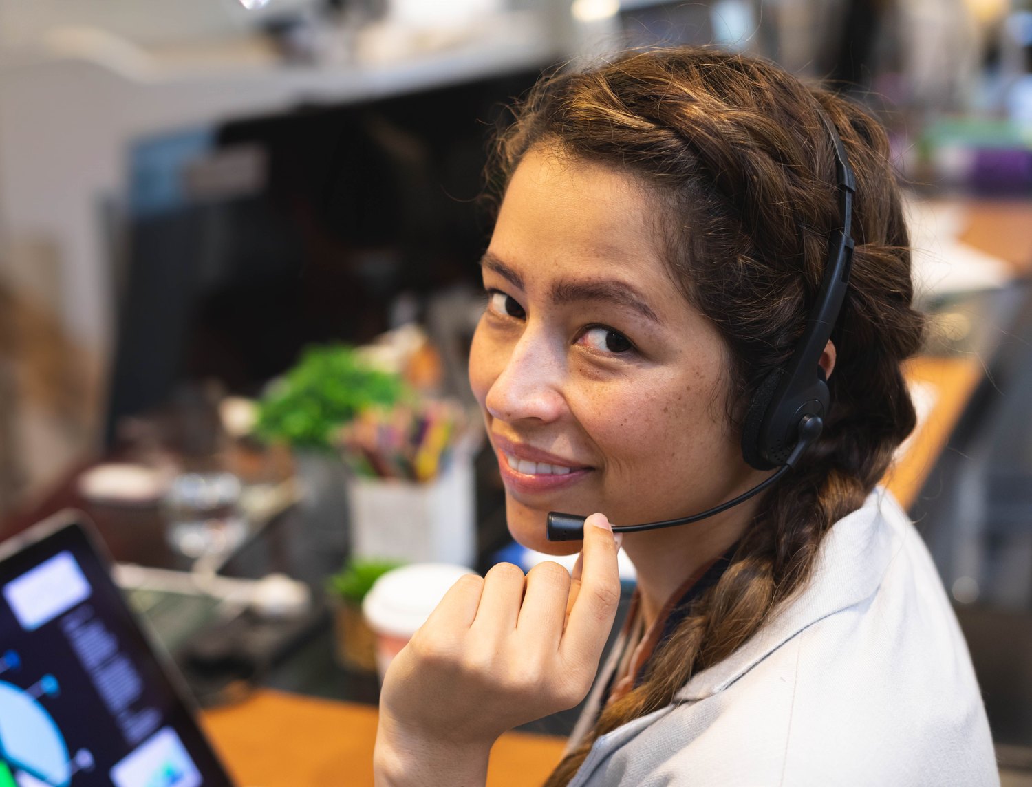Agent on a call at her workstation